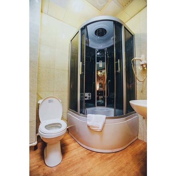 Фотографии номера Номер эконом с 1 двуспальной кроватью в Гостинице Боярд Уссурийск