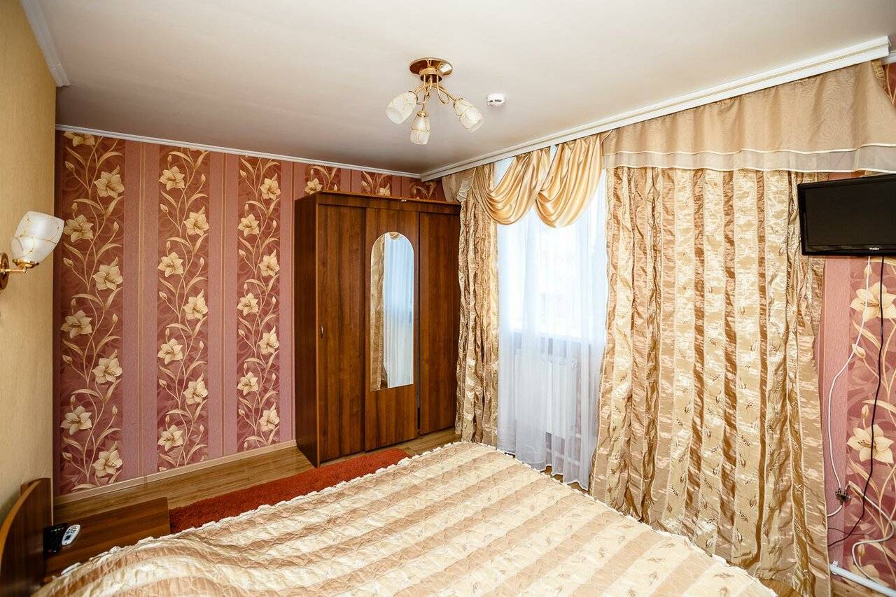 Фотографии номера Номер эконом с 1 двуспальной кроватью в Гостинице Боярд Уссурийск