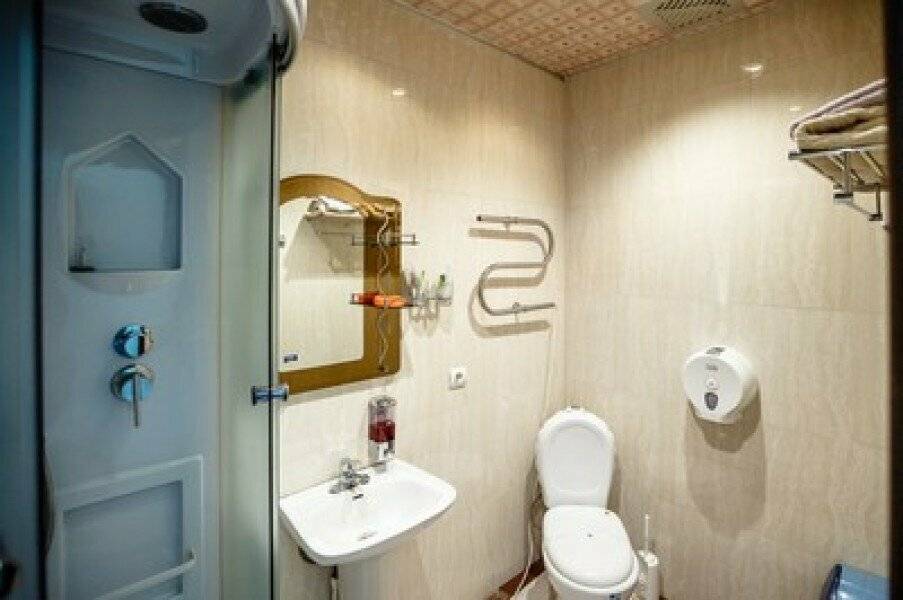 Фотографии номера Двухместный номер Делюкс с 2 двуспальными кроватями в Гостинице Боярд Уссурийск