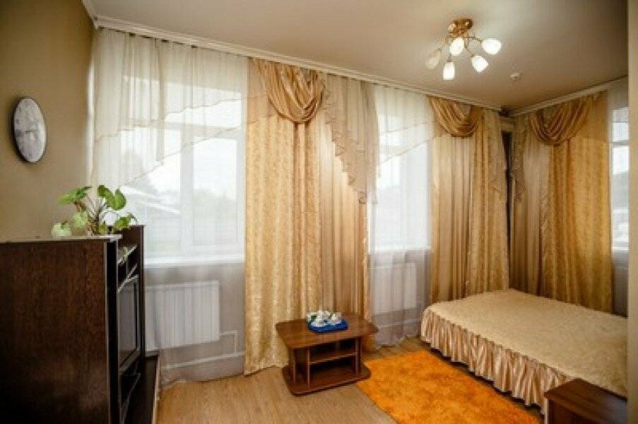 Фотографии номера Двухместный номер Делюкс с 2 двуспальными кроватями в Гостинице Боярд Уссурийск