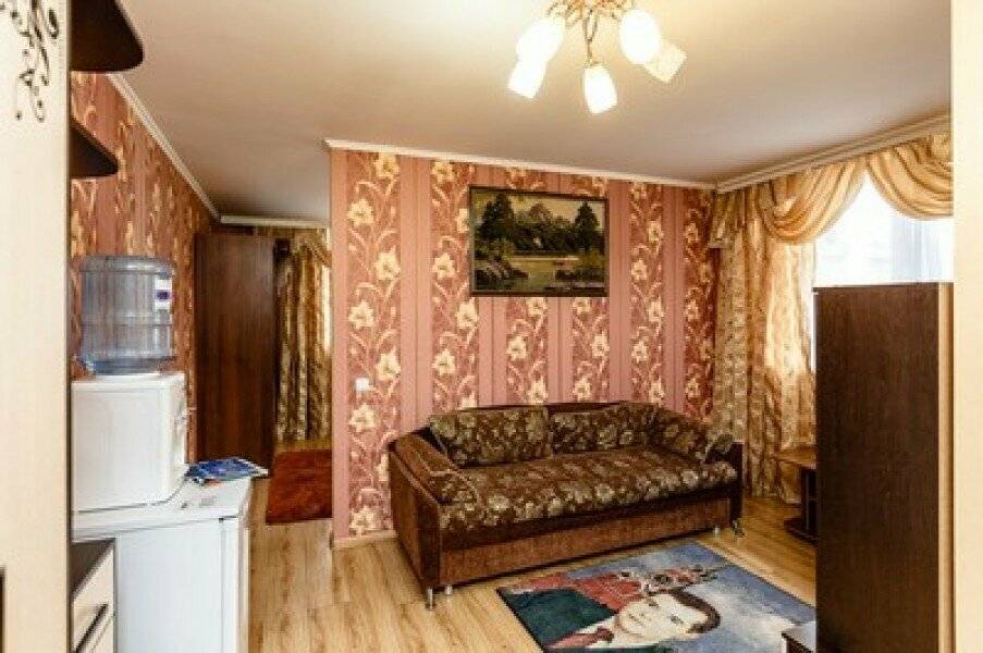 Фотографии номера Двухместный номер Делюкс с 2 двуспальными кроватями в Гостинице Боярд Уссурийск